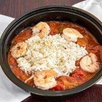 Shrimp Creole · With steamed shrimp. A rich stew of crushed tomatoes, celery, onion, green peppers, and spec...