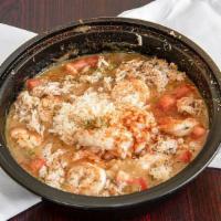 Seafood Gumbo · With steamed shrimp, oysters, and real crab meat. A broth-based dish of tomato, okra, celery...