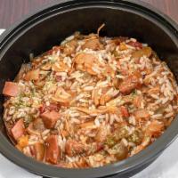 Classic Jambalaya · A spicy rice dish of sauteed onion, peppers, and stewed tomato with Cajun beef sausage and c...