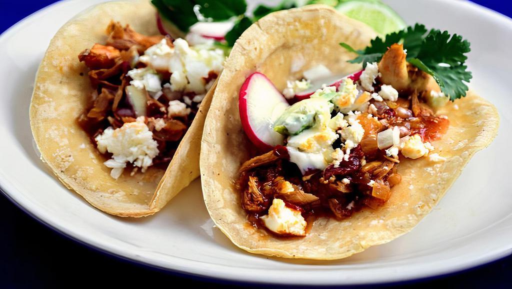 Roasted Chicken Taco · 2 tortillas Chopped with citrus-marinated fire-grilled diced onion & cilantro