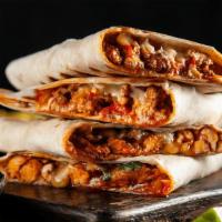 Steak Quesadilla · Sliced Tenderloin beef, mixed with grilled onions, peppers and Mexican cheese.