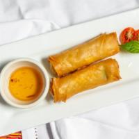 #11. Fresh Vegetable Spring Rolls (2) · Fresh rice noodle lettuce, shredded carrot and cilantro wrapped in steamed rice paper, chili...
