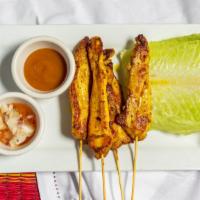 #2. Beef Or Chicken Satay · Tender beef or chicken marinated in coconut milk, curry, and other spices served with both T...