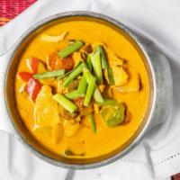 #36. Mango Curry (Kang Mhamuang) · Fresh mango simmered with sliced tender chicken in yellow curry, enhanced with bell peppers,...