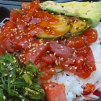 Sweet & Spicy Poke Bowl · Hamachi and salmon, cucumber, tomato, avocado, asparagus, jalapeño, sesame seeds, cilantro, ...