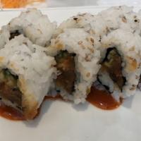 Spicy Salmon Roll · Spicy salmon, spicy mayo, masago, scallions, and cucumber, inside sesame seeds in a nori wra...