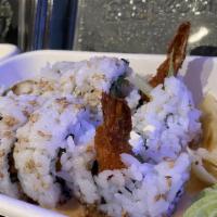 Shrimp Tempura Roll · Shrimp tempura, cream cheese, cucumber, tomato, cilantro, jalapeño inside out sesame seeds t...