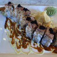 Mother Of Dragons Roll · Shrimp tempura, cucumber, and spicy tuna topped with seared tuna, tobiko, wasabi aioli, spic...