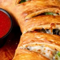 Supreme Calzone · Pepperoni, sausage, onions, mushrooms, green peppers and black olives.