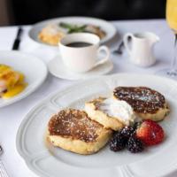 Lemon Ricotta Pancakes · served with a side of 100% pure Canadian maple syrup