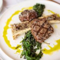 Prime Filet · Prime filet with roasted bone marrow and grilled kale.