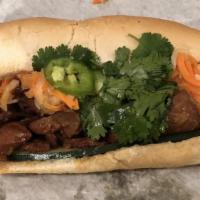 Ginger Chicken Banh Mi Sandwich · Simmered in a savory caramel sauce.