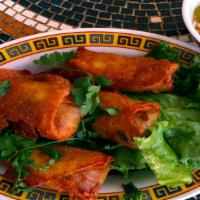 Vietnamese Eggrolls · 3 shrimp & pork eggrolls with lettuce, mint & dipping sauce.