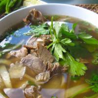 Beef Pho - Phở Bo · Traditional beef broth simmered with onions and ginger over an open flame & pan-toasted spic...