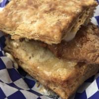 Chicken Biscuit · House-made buttermilk biscuit smeared with maple butter and served with buttermilk-brined an...