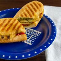 Chicken Pesto Panini · Grilled chicken breast, roasted red pepper, pesto sauce, and swiss cheese.