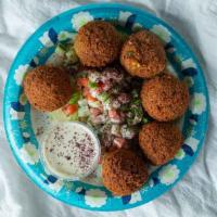 Falafel Appetizer · Fried patties of ground chickpeas served with tahini.