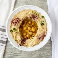 Hummus · Pureed chickpea dip drizzled with olive oil. 1/2 Half of pound