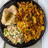Chicken Shawarma Platter · Succulent layers of chicken, served with rice, with Hummus and Jerusalem salad  No Extras Wi...