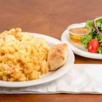 Lobster Mac & Cheese Dinner · Lobster meat tossed with cavatappi pasta and our cheddar cheese sauce; topped with bread cru...