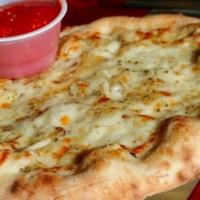 Garlic Cheese Bread · Olive oil, Parmesan, fresh sliced garlic, oregano, mozzarella with a side of crushed tomato ...