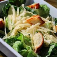 Half Caesar Salad · Romain, Parmesan, Caesar dressing, crushed croutons