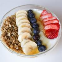 Parfait · plain greek yogurt topped with granola, banana, 
blueberries, strawberries & honey drizzle