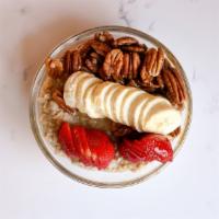 Steel Of Oats · organic steal cut oats cooked in almond milk topped
with pecans, banana, blueberries, strawb...