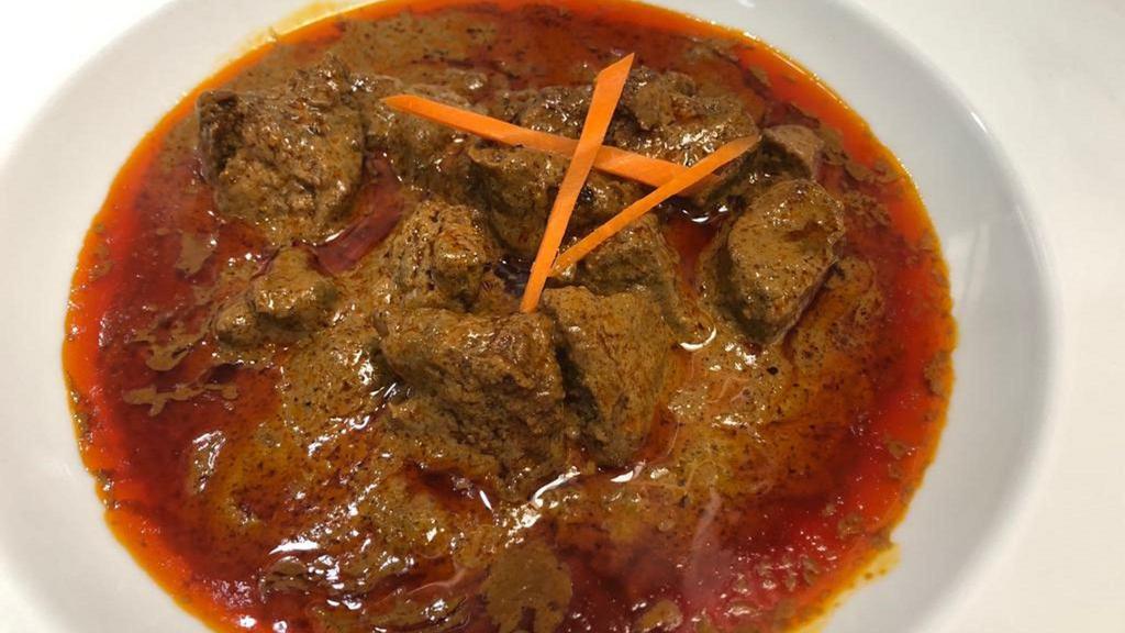Beef Kalio Rendang · Slow cooked beef in coconut milk with rendang spices. Served with rendang gravy.