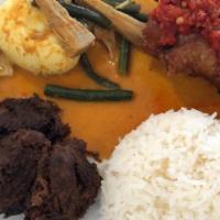 Nasi Padang With Fried Chicken · Combination plate of beef rendang, fried chicken in chili sauce, hard boiled egg, young jack...