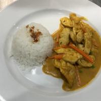 Ayam Kari · Chicken fillet, carrots, and green peas in coconut milk and curry spices.