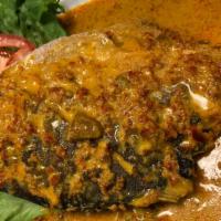Gulai Ikan Kuning · Fried whole pompano fish with yellow gravy.