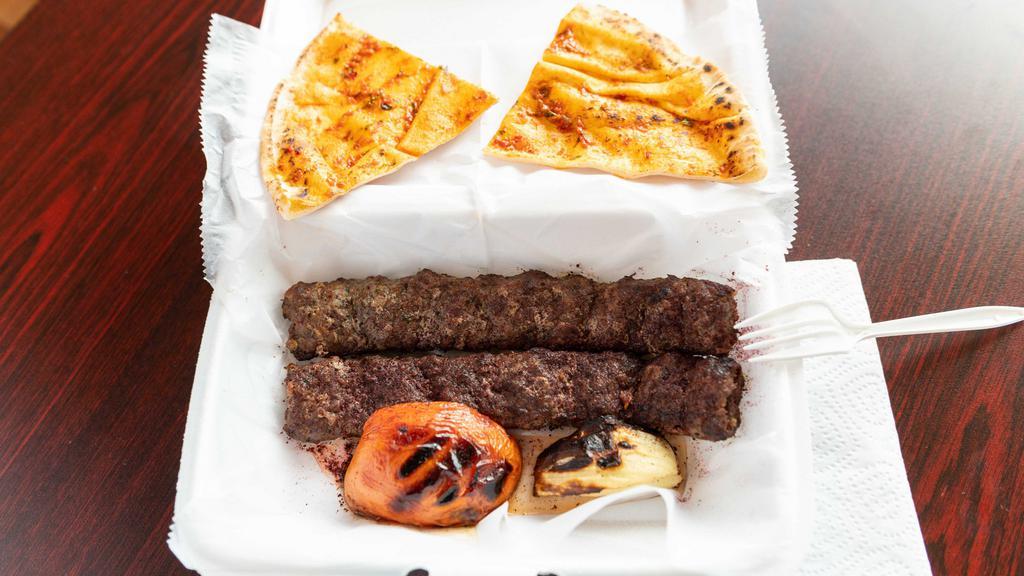 Beef Kafta · Ground beef and lamb, parsley, onions and spices chargrilled and served with rice.
