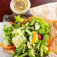 Fattoush Salad · Lettuce, tomato, red onion, cucumber, parsley and pita chips topped with special dressing.