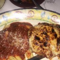 Chicken Parmigiana · Favorite. Lightly breaded cutlet, marinara, mozzarella, side of spaghetti marinara.