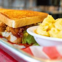 Freebird Club · Fried chicken tenders, bacon, lettuce, tomato, mayo and honey mustard on toasted Texas toast.