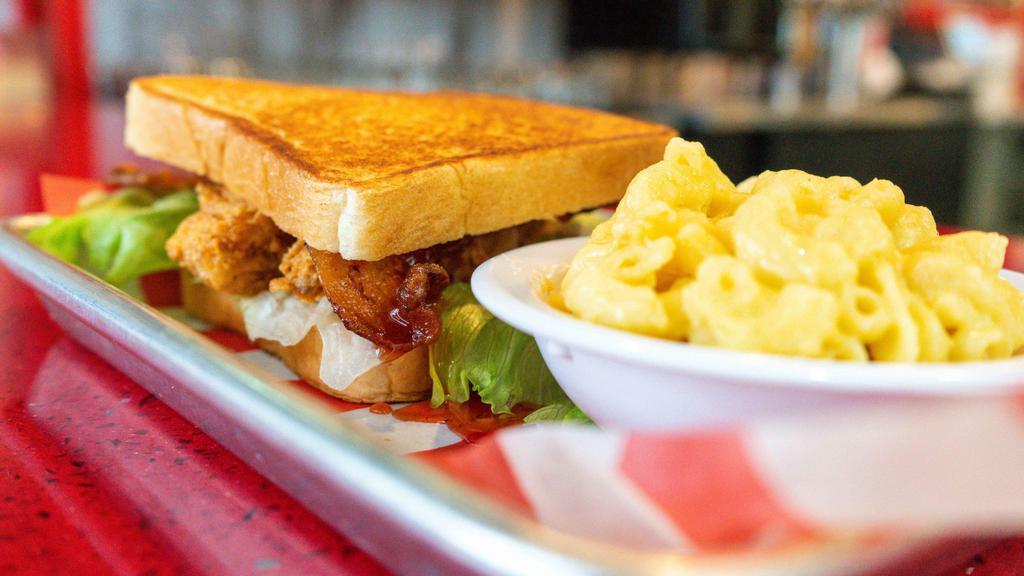 Freebird Club · Fried chicken tenders, bacon, lettuce, tomato, mayo and honey mustard on toasted Texas toast.