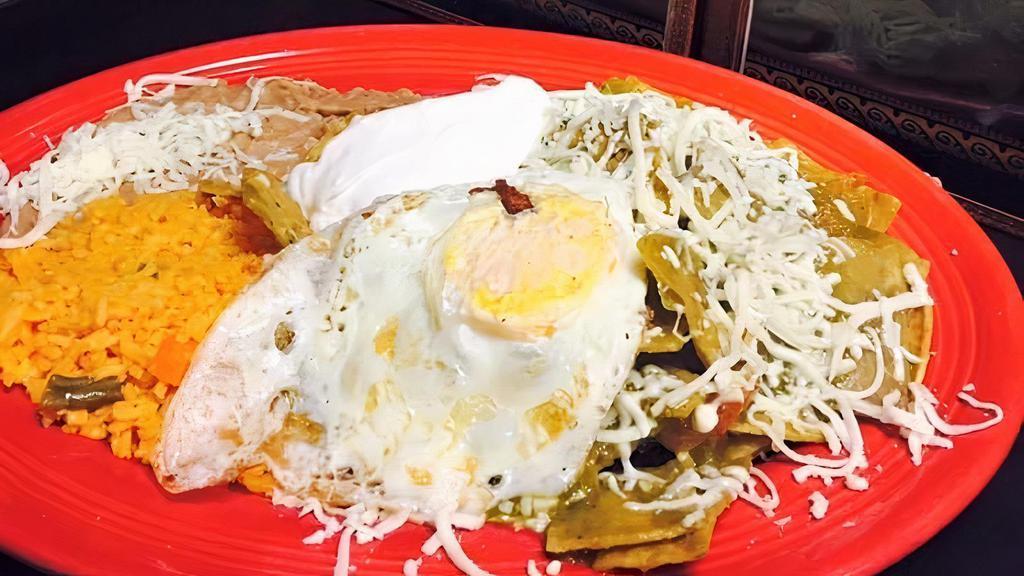 #68 Chilaquiles  · chips cocinados con la salsa y carne que guste( sin carne $8.99 y con carne 1.99 extra ) 1 huevo(porfavor de dejarnos saber como gusta el huevo ) y arroz y frijoles.
chips cooked with the sauce and meat you like (without meat $8.99 and with meat 1.99 extra) 1 egg (please let us know how you like the egg) and rice and beans.
chips cooked with the sauce and meat you like (without meat $8.99 and with meat 1.99 extra) 1 egg (please let us know how you like the egg) and rice and beans.
chips cooked with the sauce and meat you like (without meat $8.99 and with meat 1.99 extra) 1 egg (please let us know how you like the egg) and rice and beans.
chips cooked with the sauce and meat you like (without meat $8.99 and with meat 1.99 extra) 1 egg (please let us know how you like the egg) and rice and beans.
chips cooked with the sauce and meat you like (without meat $8.99 and with meat 1.99 extra) 1 egg (please let us know how you like the egg) and rice and beans.