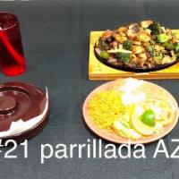 # 21 Parillada Azteca  · la parilladas de carne de rez,pollo,chorizo,cmarones y costillas  de rez incluyen chile morr...