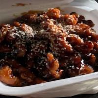 Golden Sesame Chicken · Hot and Spicy.
Served with white rice.