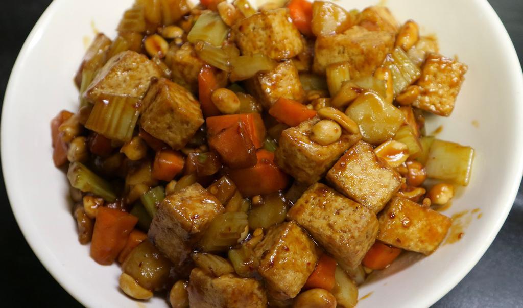 Kung Po Tofu · Peanut, Carrot, Bamboo Shoot, Water Chestnut, Celery. Hot and spicy.