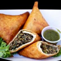 Veggie Sambusa · Pastry filled with lentils, onion herbs and spices.