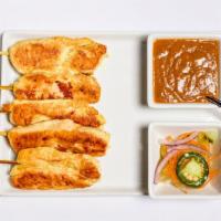 Satay Selections · Marinated chicken, or tofu grilled on skewers, served with peanut sauce and cucumber salad.