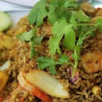 Fried Rice · Stir fried rice, onions, carrots, green beans, corns, green onions, egg & your choice of mea...