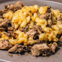 Jerk Steak Mac & Cheese By Jerk 48 · By Jerk 48. Mac & cheese topped with jerk steak.  Contains gluten, dairy, soy, fish, and nig...