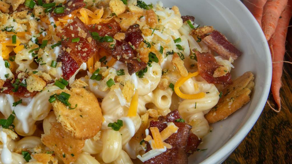 Loaded Baked Potato Mac N' Cheese · Cavatappi pasta, Cheddar, mozzarella, apple smoked bacon, signature cheese sauce, sour cream, chives, buttered toasted Ritz crumb.
