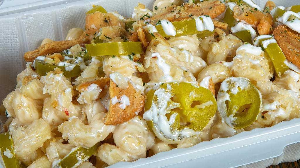 Jalapeno Popper Mac N' Cheese · Cavatappi pasta, Pepper Jack, pickled jalapeno, bacon, sour cream, signature cheese sauce, buttered toasted Ritz crumb.