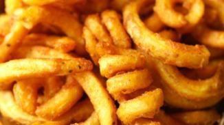 Twisty Fries · (Vegetarian) Idaho potato fries cooked until golden brown, twisted, and garnished with a hou...