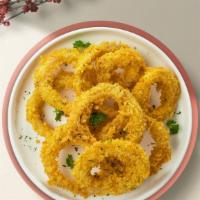 Lord Of The Onion Rings · (Vegetarian) Sliced onions dipped in a light batter and fried until crispy and golden brown.