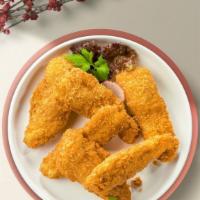 Cheeky Chicken Strips · Chicken strips breaded and fried until golden brown. Served with your choice of dipping sauce.
